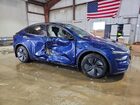 2026 Tesla Model Y Blue vin: 7SAYGDED5TF423926