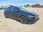 2026 Tesla Model Y Black vin: 7SAYGDED5TF560090