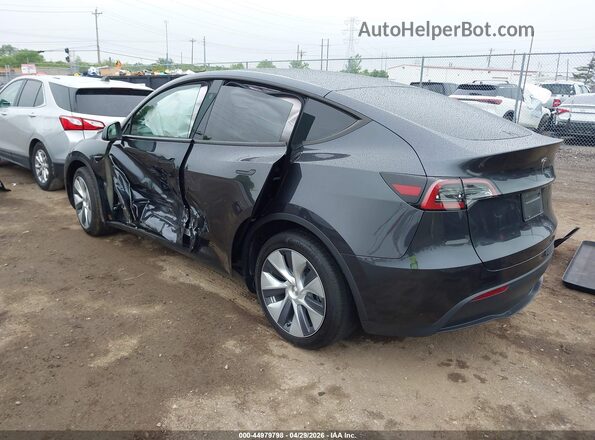 7SAYGDED6RF087311 2024 TESLA MODEL Y Black Tył lewy