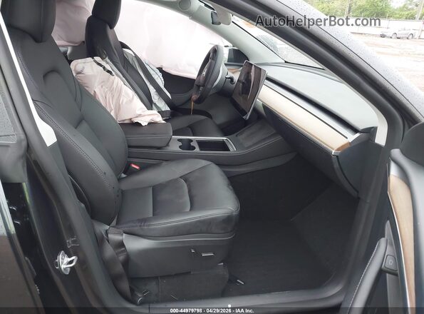 7SAYGDED6RF087311 2024 TESLA MODEL Y Black Widok wnętrza z przodu