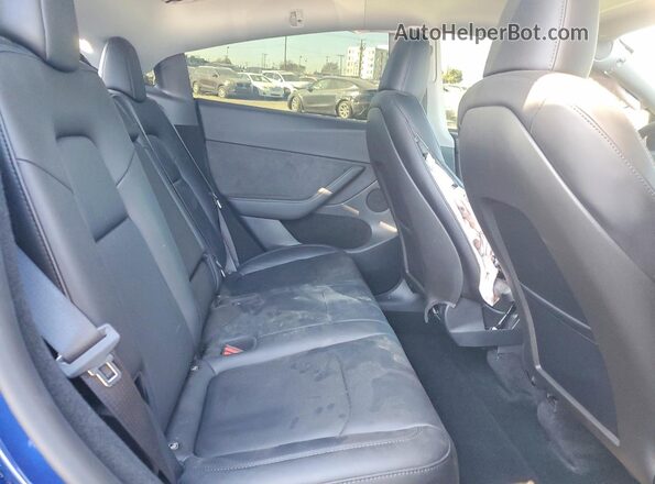 7SAYGDED7RF120574 2024 TESLA MODEL Blue Widok wnętrza z tyłu