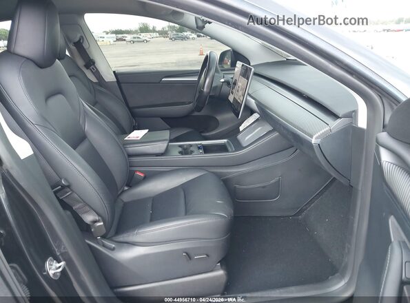 7SAYGDED8RF164955 2024 TESLA MODEL Y Gray Вид салону спереду