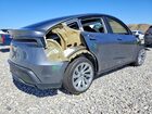 2026 Tesla Model Y Silver vin: 7SAYGDEDXTA598282