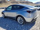 2026 Tesla Model Y Silver vin: 7SAYGDEDXTA598282