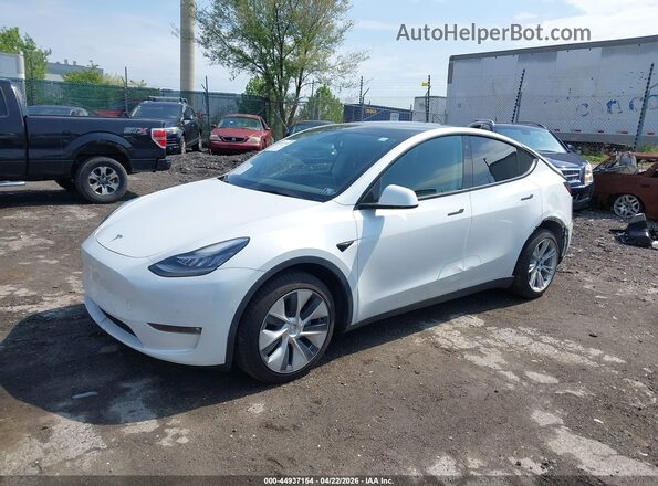 7SAYGDEE0NF384495 2022 TESLA MODEL Y White წინა მარცხენა ხედი სამი მეოთხედიდან