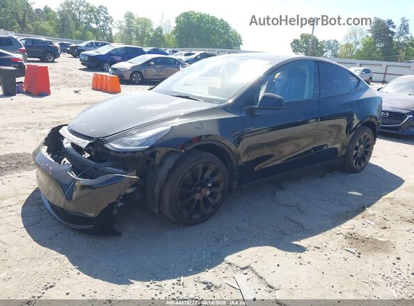 7SAYGDEE0PA116319 2023 TESLA MODEL Y Black Vista tres cuartos delantera izquierda