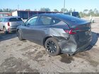 2023 Tesla Model Y Awd/long Range Dual Motor All-wheel Drive Gray vin: 7SAYGDEE1PA107919