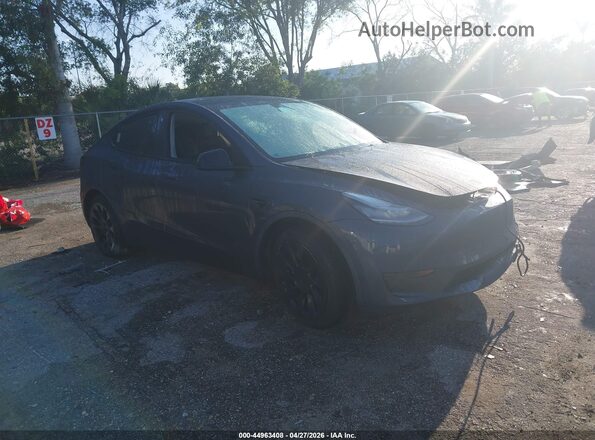 7SAYGDEE1PA107919 2023 TESLA MODEL Y Gray Delantero derecho