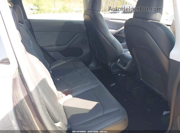 7SAYGDEE1RA279810 2024 TESLA MODEL Y Black VIN կոդի պիտակի տեսք