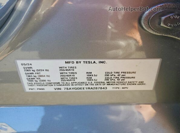7SAYGDEE1RA287843 2024 TESLA MODEL Silver VIN კოდის სტიკერის ხედი