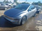 2026 Tesla Model Y All-wheel Drive/long Range Launch Series/premium All-wheel Drive Gray vin: 7SAYGDEE1TF430073