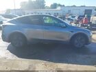 2026 Tesla Model Y All-wheel Drive/long Range Launch Series/premium All-wheel Drive Gray vin: 7SAYGDEE1TF430073