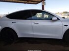 2026 Tesla Model Y All-wheel Drive/long Range Launch Series/premium All-wheel Drive White vin: 7SAYGDEE1TF535874