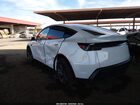 2026 Tesla Model Y All-wheel Drive/long Range Launch Series/premium All-wheel Drive White vin: 7SAYGDEE1TF535874