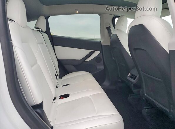 7SAYGDEE2NF331751 2022 TESLA MODEL White Vista de los asientos traseros