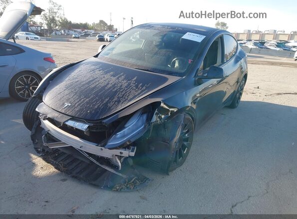 7SAYGDEE2PA056849 2023 TESLA MODEL Y Black Առջևի ձախ երեք քառորդ տեսարան