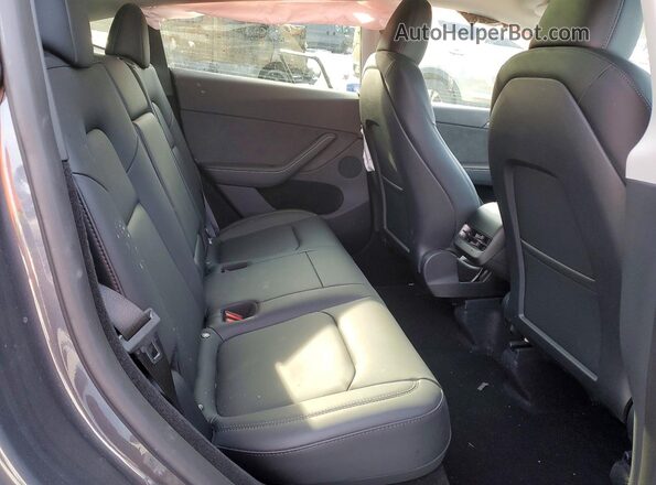 7SAYGDEE2PA149175 2023 TESLA MODEL Charcoal Vista interior trasera