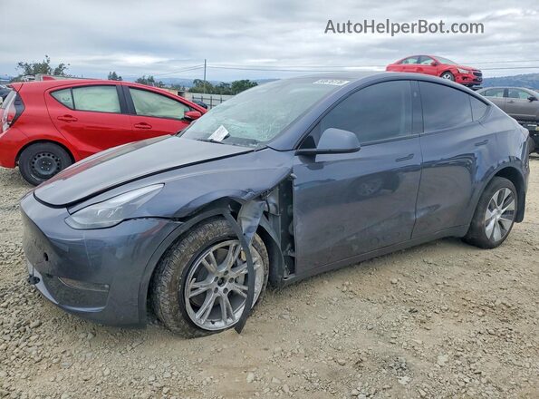7SAYGDEE2PF816474 2023 TESLA MODEL Gray Vista tres cuartos delantera izquierda