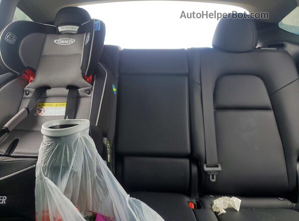 7SAYGDEE2PF816474 2023 TESLA MODEL Gray Vista de los asientos traseros