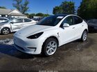 2023 Tesla Model Y Awd/long Range Dual Motor All-wheel Drive White vin: 7SAYGDEE2PF839690