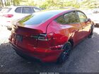 2024 Tesla Model Y Long Range Dual Motor All-wheel Drive Red vin: 7SAYGDEE2RF158142