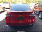 2024 Tesla Model Y Long Range Dual Motor All-wheel Drive Red vin: 7SAYGDEE2RF158142