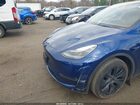2024 Tesla Model Y Long Range Dual Motor All-wheel Drive Blue vin: 7SAYGDEE2RF199855