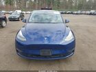 2024 Tesla Model Y Long Range Dual Motor All-wheel Drive Blue vin: 7SAYGDEE2RF199855