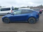 2024 Tesla Model Y Long Range Dual Motor All-wheel Drive Blue vin: 7SAYGDEE2RF199855