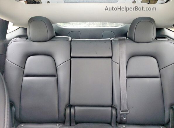7SAYGDEE3PF601847 2023 TESLA MODEL White Vista de los asientos traseros