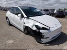 2024 Tesla Model Y Long Range Dual Motor All-wheel Drive White vin: 7SAYGDEE3RA256013