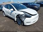 2022 Tesla Model Y Long Range Dual Motor All-wheel Drive White vin: 7SAYGDEE4NF321061