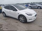 2024 Tesla Model Y Long Range Dual Motor All-wheel Drive White vin: 7SAYGDEE4RA257896