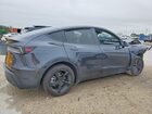 2026 Tesla Model Y Black vin: 7SAYGDEE4TA380511