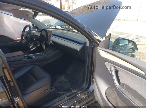 7SAYGDEE5PA024493 2023 TESLA MODEL Y Black Vista interior delantera