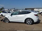 2023 Tesla Model Y Awd/long Range Dual Motor All-wheel Drive White vin: 7SAYGDEE5PA129373