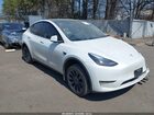 2023 Tesla Model Y Awd/long Range Dual Motor All-wheel Drive White vin: 7SAYGDEE5PF763477