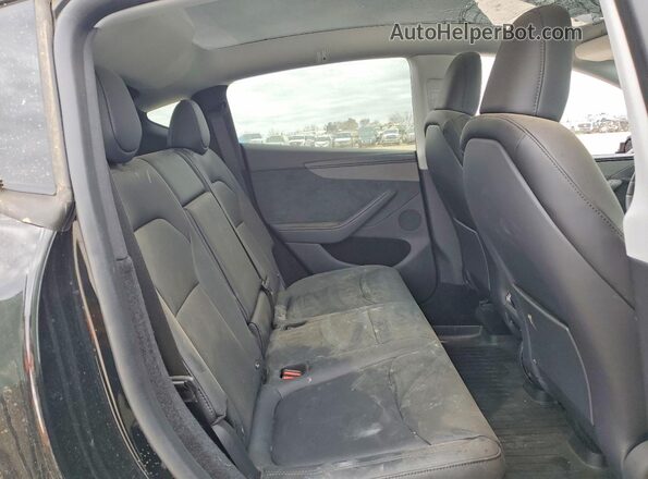 7SAYGDEE5TA491035 2026 TESLA MODEL Black Rear seats view