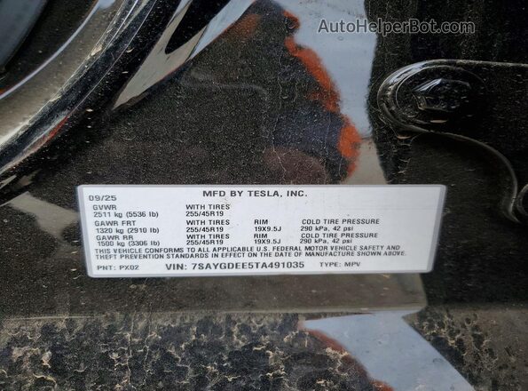 7SAYGDEE5TA491035 2026 TESLA MODEL Black VIN sticker view