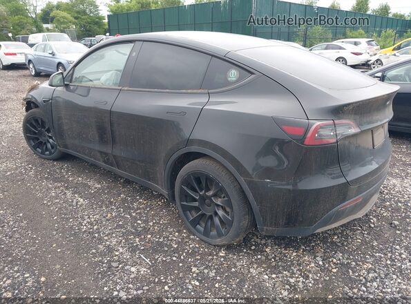 7SAYGDEE6PA180980 2023 TESLA MODEL Y Black Tył lewy