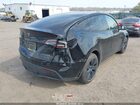 2025 Tesla Model Y Long Range Dual Motor All-wheel Drive Black vin: 7SAYGDEE6SA360372
