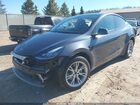 2022 Tesla Model Y Long Range Dual Motor All-wheel Drive Gray vin: 7SAYGDEE7NA021818