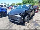 2024 Tesla Model Y Long Range Dual Motor All-wheel Drive Gray vin: 7SAYGDEE7RA305942