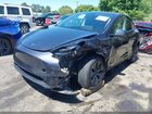 2024 Tesla Model Y Long Range Dual Motor All-wheel Drive Gray vin: 7SAYGDEE7RA305942