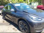 2024 Tesla Model Y Long Range Dual Motor All-wheel Drive Gray vin: 7SAYGDEE7RA305942