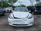 2024 Tesla Model Y Long Range Dual Motor All-wheel Drive White vin: 7SAYGDEE7RA321199
