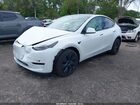 2024 Tesla Model Y Long Range Dual Motor All-wheel Drive White vin: 7SAYGDEE7RA321199