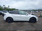 2024 Tesla Model Y Long Range Dual Motor All-wheel Drive White vin: 7SAYGDEE7RA321199