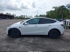 2024 Tesla Model Y Long Range Dual Motor All-wheel Drive White vin: 7SAYGDEE7RA321199