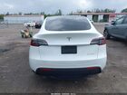 2024 Tesla Model Y Long Range Dual Motor All-wheel Drive White vin: 7SAYGDEE7RA321199